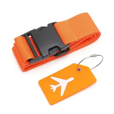 Orange luggage strap with black buckle, coiled beside a matching orange airplane tag